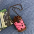 Brown and pink color-blocking mini cross-body drawstring bag, casual outdoor water bottle bag. - Coffee