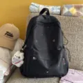 Sac à dos noir décontracté avec étoiles brodées et pendentif ours pour les étudiants. - L / Avec Pendentif / Noir