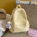 Sac à dos en toile jaune avec broderie d'étoiles et pendentif ours pour le quotidien. - S / Avec Pendentif / Jaune