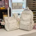 Cute canvas school backpack and tote bag set with colorful star doodle print for student daily use. - 2-Piece Set with Smiling Star Pendant / White