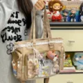 Japanese transparent lace ita bag for daily doll storage, cute shoulder tote for anime fans. - With Charm / Khaki