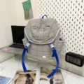 Petit sac à dos matelassé pour femme, sac à dos décontracté léger à cordon, style gris élégant. - Gris