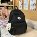 Zaino casual minimalista nero borsa scolastica per studenti con simpatico ciondolo cucciolo. - con portachiavi / Nero