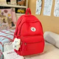 Zaino stile college rosso con grazioso ciondolo in peluche, borsa scolastica casual. - con portachiavi / Rosso