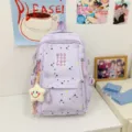 Japanese ins style purple backpack for schoolgirls with star print and cute plush pendant. - With Pendant / Purple