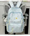 Light blue school backpack for girls, large capacity aesthetic star pattern book bag with plush pendant. - With Pendant / Blue