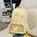 Casual light yellow school backpack with clear front pocket and cute star patch design. - Backpack Only (Without Pendant) / Yellow