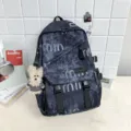 Stylish dark grey street style backpack with cute bear pendant for daily school and travel use. - Charm / Black