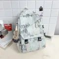 Casual student backpack for women, trendy printed school bag with cute bear pendant and pockets. - Charm / White