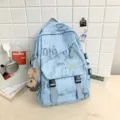 Light blue casual student backpack with stylish letter print and cute bear pendant variant. - Charm / Blue