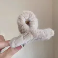 Fluffy plush hair claw clip for women, soft winter hair catcher and cute shark clip variant. - Apricot