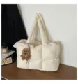 Beige quilted puffer tote bag with cute bear charm, soft padded shoulder handbag for women. - With Pendant / White