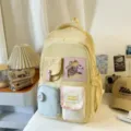 Colorful canvas school backpack for students, multi-pocket casual daypack with cute badges. - No Pendant / Yellow