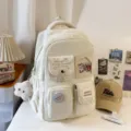Cream white multi-pocket canvas backpack with cute embroidery and fluffy pendant for daily school. - Pendant Style / White