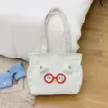 Cute white corduroy tote bag with cat ears and red glasses design, perfect bento lunch handbag. - White