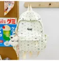 Casual white polka dot canvas backpack for school girls with cute bow and bear pendant. - With Charm / S / Beige