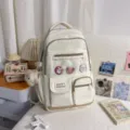 Korean style white canvas school backpack with cute bear pendant and multi pockets for students. - With Charm / Off White