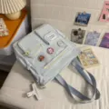Light blue multi-pocket canvas backpack with cute badges, stylish student school bag. - Tutoring Bag / Blue