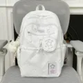 White star pattern school backpack with cute mini pouch and fluffy charm for daily use. - With Charm / White