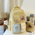 Dopamine color blocking canvas backpack for school students with multiple pockets and cute charms. - Pendant Style / Yellow
