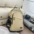 Beige minimalist daily casual backpack featuring black accents and cute cat pendant. - Khaki Small With Charm