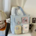 Light blue canvas tote bag with multi pockets, cute badges and star pendant for daily use. - Tutoring Bag With Pendant / Blue