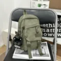 Casual dark green mini backpack variant with plush cat pendant for daily student travel use. - Small With Pendant / Green