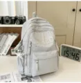 Grey star print school backpack for students, large capacity casual daily book bag with pockets. - Gray With Pendant