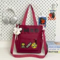 Burgundy casual canvas tote bag large capacity shoulder crossbody bag student school bag ins style - Shoulder Bag - With Pendant / Red