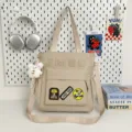 Large capacity canvas tote bag beige shoulder bag casual student book bag with stylish patches. - Shoulder Bag - With Pendant / Khaki