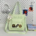 Green canvas shoulder bag large capacity casual student tote bag with cute plush pendant - Shoulder Bag - With Pendant / Green