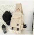 Casual canvas sling bag for men and women, stylish chest backpack with N patch, beige. - With Pendant / White
