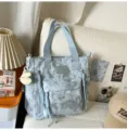 Light blue star moon print canvas tote bag, casual shoulder bag for students and daily commuting. - Tote Bag Blue With Pendant