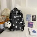 Korean style campus polka dot backpack casual lightweight school bag with cute panda pendant - With Pendant / S / Black