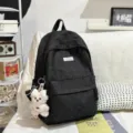 Black polka dot student backpack with cute bear pendant, stylish mini daypack for daily travel. - With Pendant / L / Black