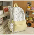 Cute cartoon cat canvas backpack for women, large capacity casual school bookbag with front pocket. - With Charm / L / Yellow