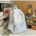 Cute cartoon cat canvas backpack for women, large capacity school bag with plush pendant. - With Charm / L / Blue