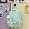 Light green star print canvas backpack with cute plush charm for daily school and travel use. - Small (With Pendant) / Green
