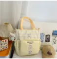 Canvas tote bag for students, aesthetic contrast plaid shoulder bag with front pocket. - With Pendant / Yellow