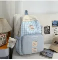 Japanese sweet plaid backpack for students, light large capacity school bag style. - Large With Charm / Blue