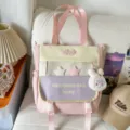 Pink and yellow colorblock canvas school backpack with multiple compartments and cute rabbit plush. - Shoulder Bag / With Pendant / Pink