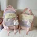 Pink colorblock school backpack set with cute bunny pendant and transparent pocket for kids. - Two-Piece Set / With Pendant / Pink