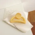 Matte semi-circular hair claw clip for women, large crescent shark clip in elegant yellow. - Yellow