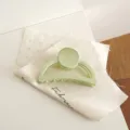 Matte light green half-moon hair claw clip, elegant aesthetic hair accessory for daily styling. - Light Green