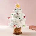Handmade crochet Christmas tree decor with star topper and colorful pom poms for holiday gift. - Star Christmas Tree / White