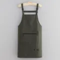 Dark green waterproof canvas kitchen apron featuring adjustable straps and front zipper pocket. - Green