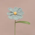 Handmade crochet flower detail view, beautiful blue petals and green stem design. - Fog Blue