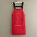 Delantal de cocina impermeable para mujer, resistente al aceite y a las manchas con bolsillo. - Correa Laminada Dos Conejitos / Rojo