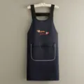 Delantal de cocina impermeable con bolsillo con cremallera, ropa de trabajo azul oscuro hogar. - Correa Laminada Dos Conejitos / Negro