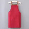 Red kitchen apron with brown straps and double pockets, durable fabric for cooking work. - Regular Fit / Burgundy